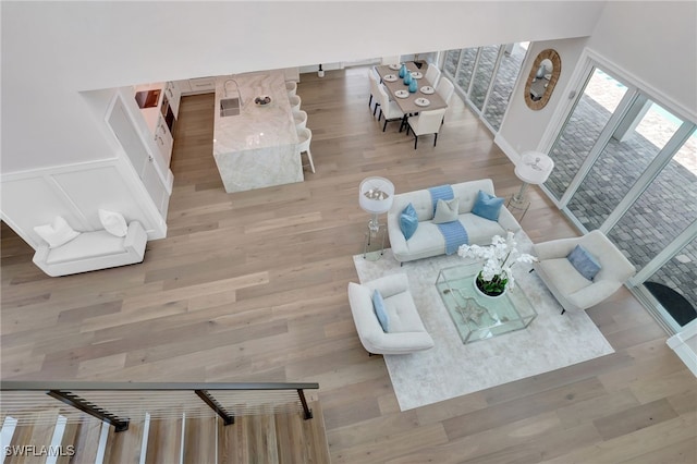 1308 Ridge St, Naples, FL 34103 - living room with light wood finished floors and baseboards