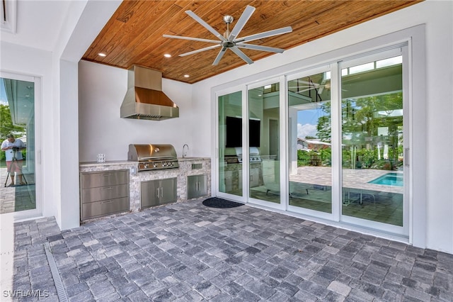 1308 Ridge St, Naples, FL 34103 - view of patio / terrace with an outdoor kitchen and ceiling fan