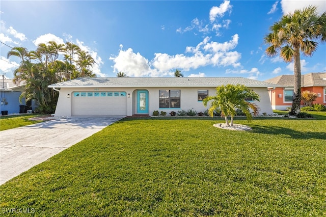 single story home with a garage and a front lawn