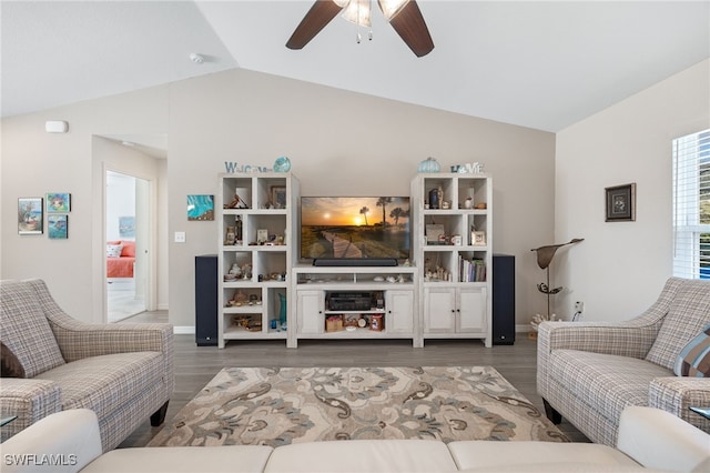 living room with lofted ceiling, hardwood / wood-style floors, and ceiling fan