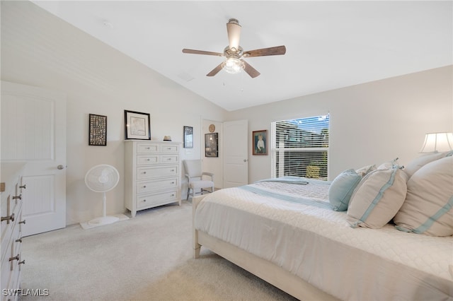 carpeted bedroom featuring lofted ceiling and ceiling fan