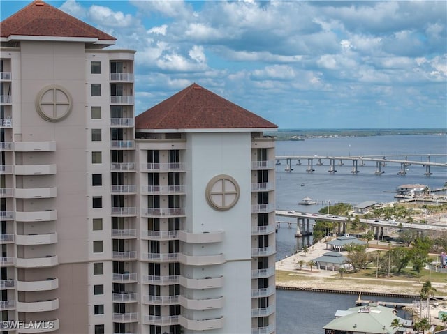 view of building exterior with a water view