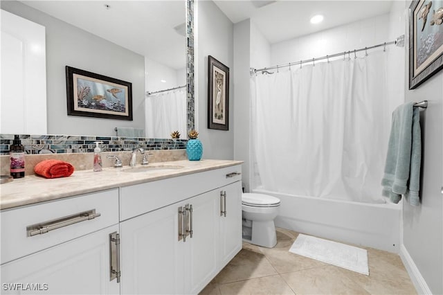 full bathroom with toilet, vanity, tile patterned floors, tasteful backsplash, and shower / bath combo