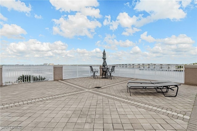 view of patio / terrace featuring a water view