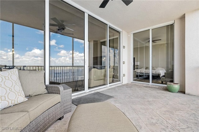 view of patio with ceiling fan