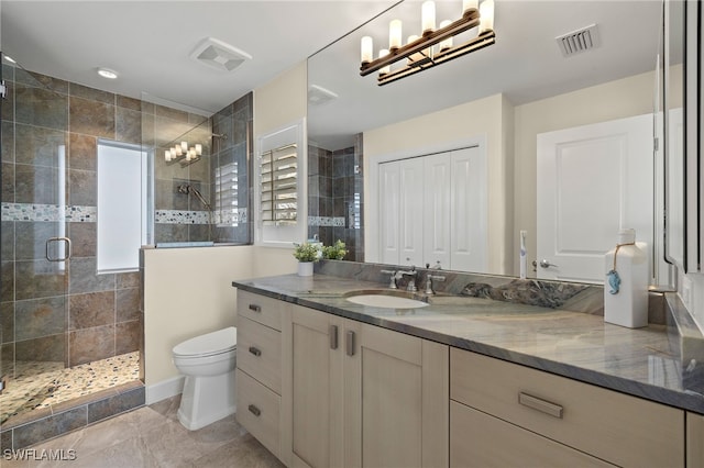 1 Sunset Captiva Ln, Captiva, FL 33924 - full bathroom featuring a shower stall, toilet, vanity, and a chandelier