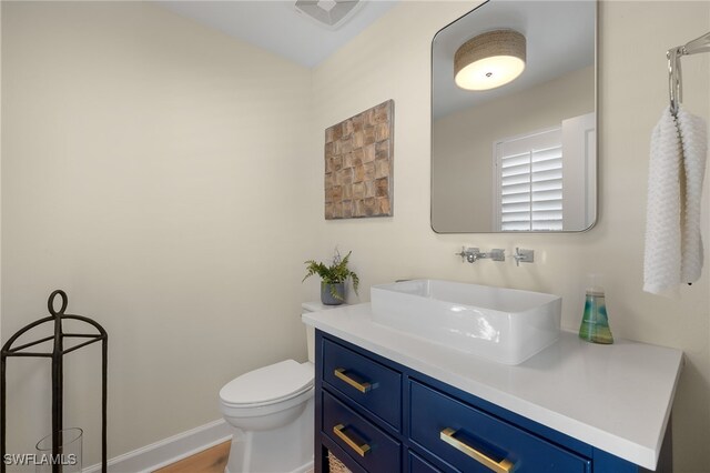 1 Sunset Captiva Ln, Captiva, FL 33924 - bathroom featuring toilet and vanity
