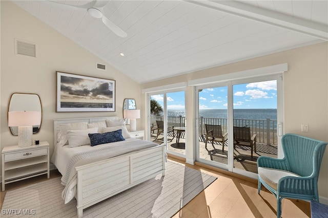 1 Sunset Captiva Ln, Captiva, FL 33924 - bedroom with vaulted ceiling, access to outside, a water view, and light wood-type flooring
