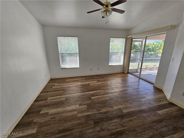 unfurnished room with ceiling fan, lofted ceiling, and dark hardwood / wood-style floors