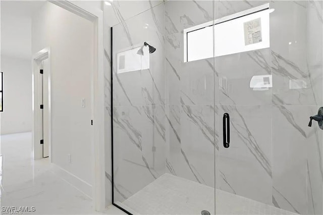 bathroom featuring an enclosed shower