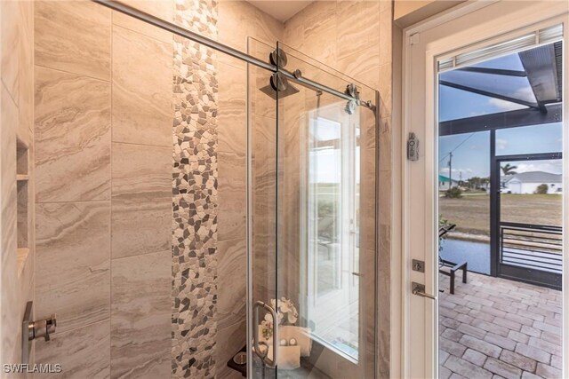 17122 Barcrest Ln, Punta Gorda, FL 33955 - bathroom with a stall shower and a water view