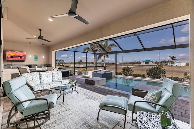 17122 Barcrest Ln, Punta Gorda, FL 33955 - view of patio with a pool with connected hot tub, outdoor lounge area, an outdoor kitchen, ceiling fan, and a lanai