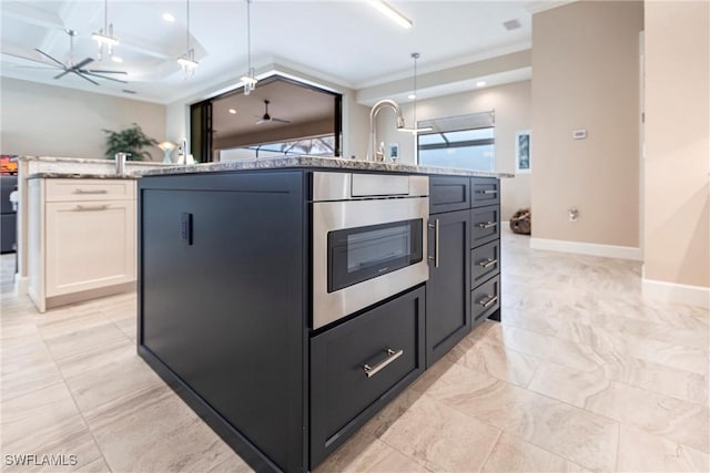17122 Barcrest Ln, Punta Gorda, FL 33955 - kitchen featuring ceiling fan, light stone counters, baseboards, ornamental molding, and decorative light fixtures
