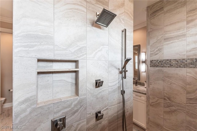 17122 Barcrest Ln, Punta Gorda, FL 33955 - bathroom featuring crown molding, a sink, a tile shower, and toilet