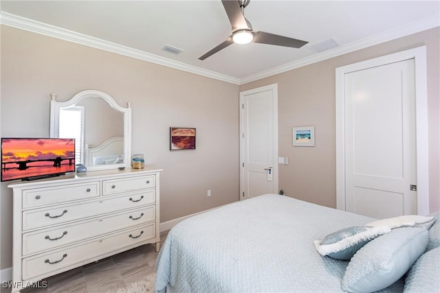 17122 Barcrest Ln, Punta Gorda, FL 33955 - bedroom featuring ceiling fan, baseboards, visible vents, and crown molding