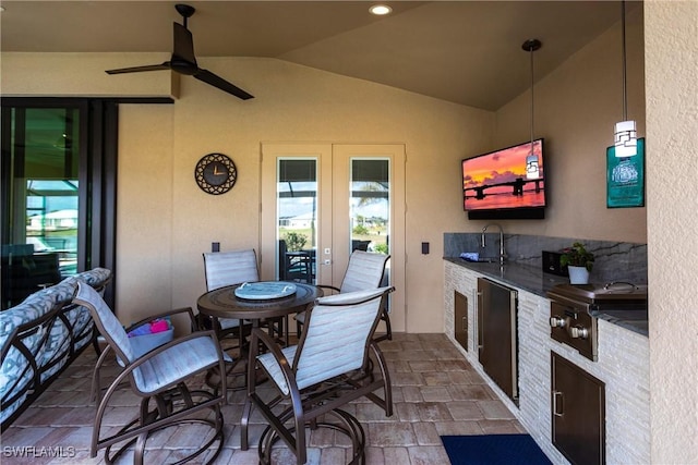 17122 Barcrest Ln, Punta Gorda, FL 33955 - view of patio featuring outdoor dining area, a sink, a ceiling fan, french doors, and exterior kitchen