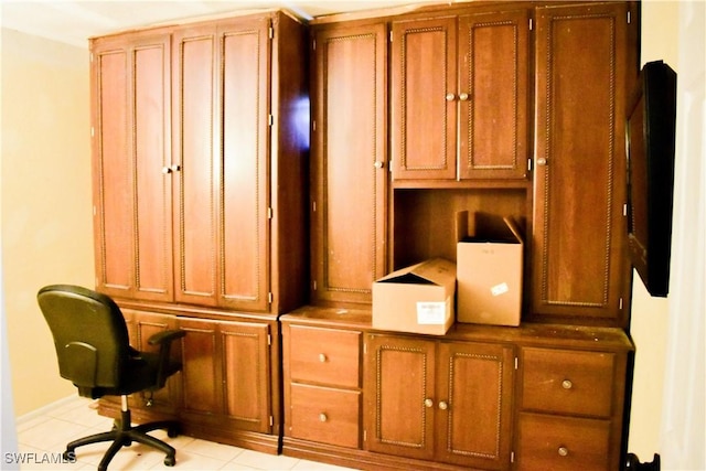 office with light tile patterned floors