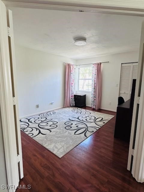 interior space with dark wood-type flooring