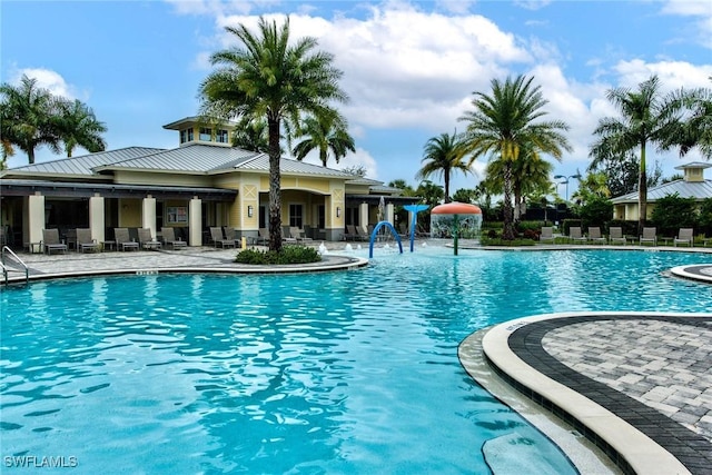 2591 Vine Ave, Naples, FL 34120 - view of pool featuring a patio area