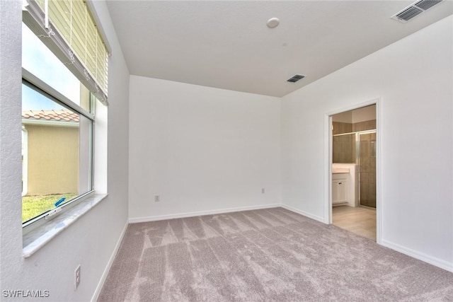 2591 Vine Ave, Naples, FL 34120 - unfurnished room featuring light carpet