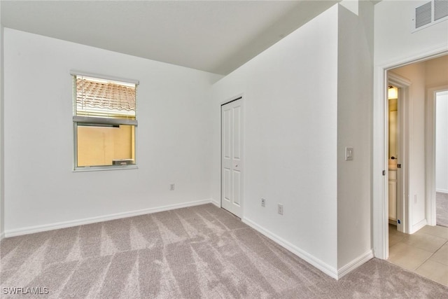 2591 Vine Ave, Naples, FL 34120 - view of carpeted spare room