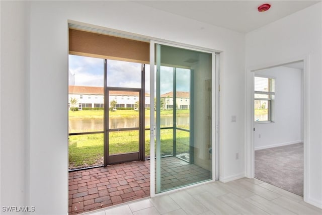 2591 Vine Ave, Naples, FL 34120 - entryway featuring a water view