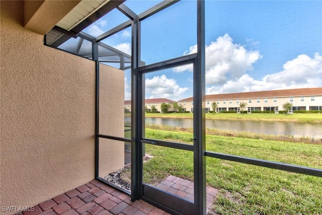 2591 Vine Ave, Naples, FL 34120 - unfurnished sunroom featuring a water view