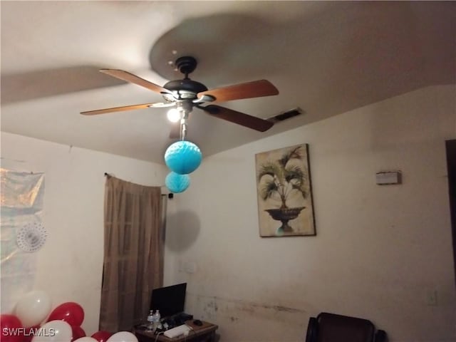 interior space featuring ceiling fan