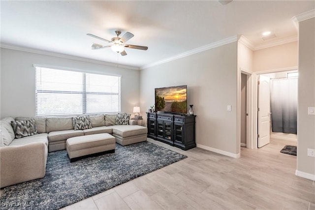 living room featuring crown molding, light hardwood / wood-style floors, and ceiling fan