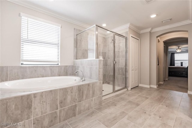 bathroom featuring tile patterned flooring, crown molding, and independent shower and bath