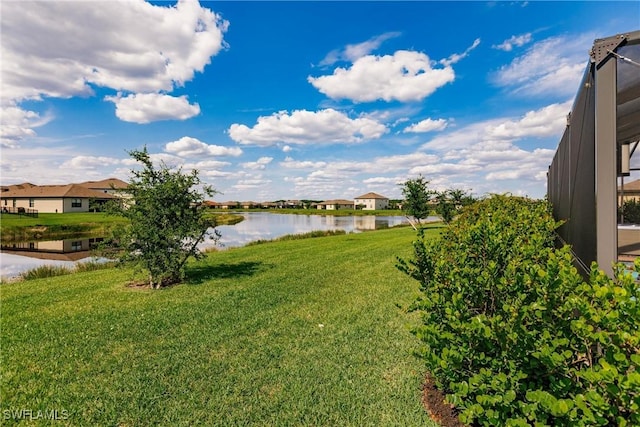 view of yard with a water view