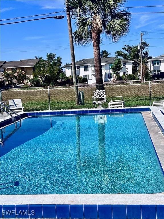 community pool with fence