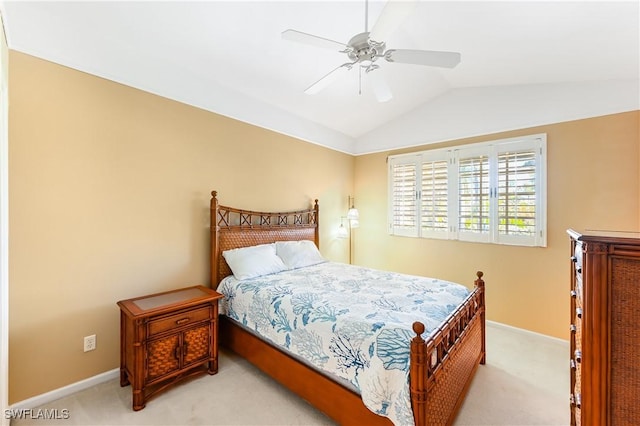 carpeted bedroom with lofted ceiling and ceiling fan