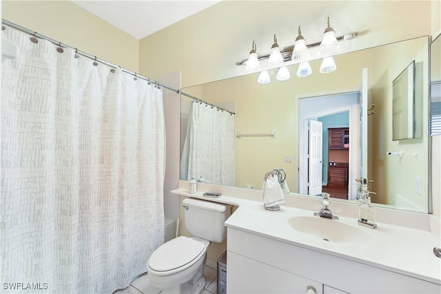 full bathroom with vanity, toilet, and shower / bath combo with shower curtain