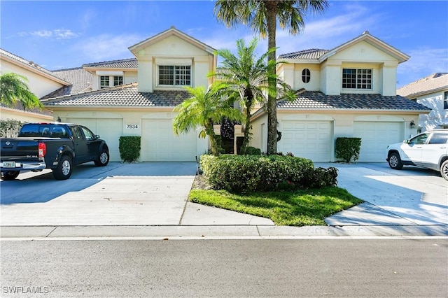 view of front of property featuring a garage