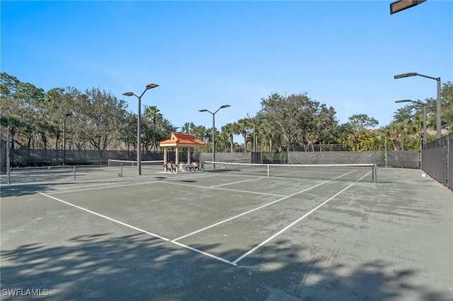 view of sport court with a gazebo