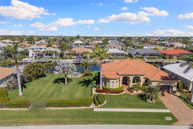 drone / aerial view featuring a water view