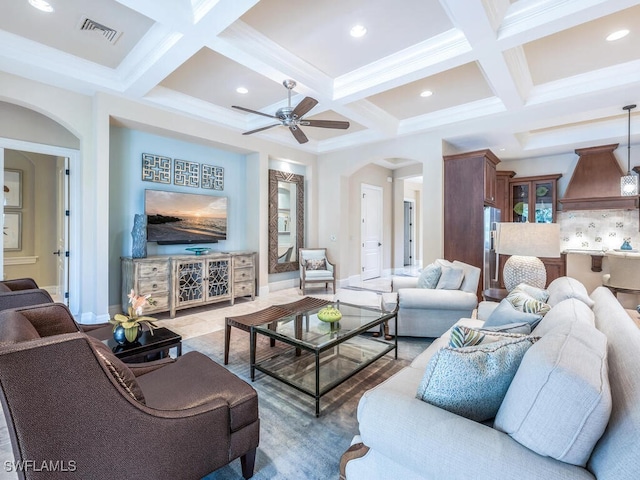 28732 La Caille Dr, Naples, FL 34119 - living area featuring arched walkways, ceiling fan, visible vents, and beam ceiling