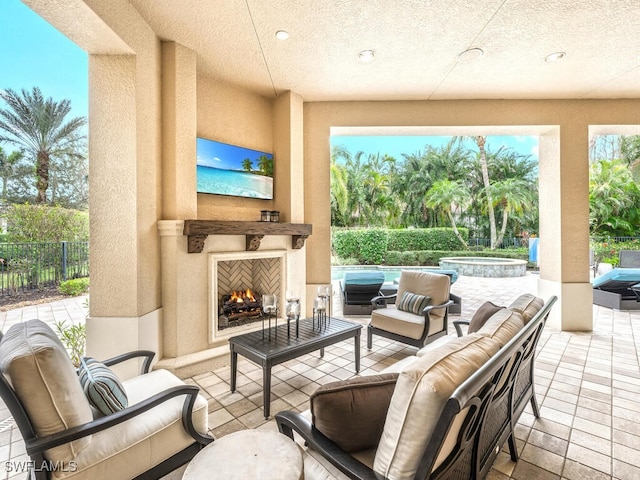 28732 La Caille Dr, Naples, FL 34119 - view of patio with an outdoor living space with a fireplace, a pool with connected hot tub, and fence