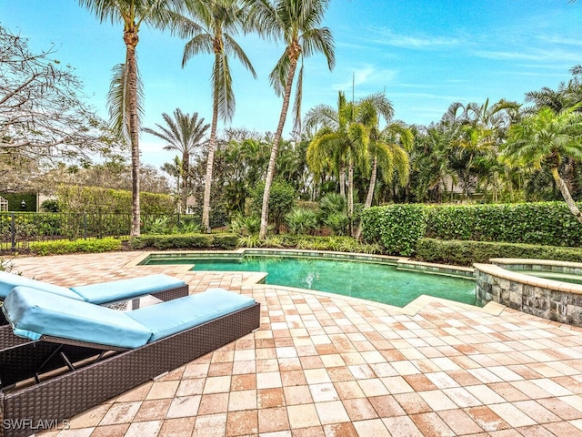28732 La Caille Dr, Naples, FL 34119 - view of swimming pool with a patio, fence, and a pool with connected hot tub