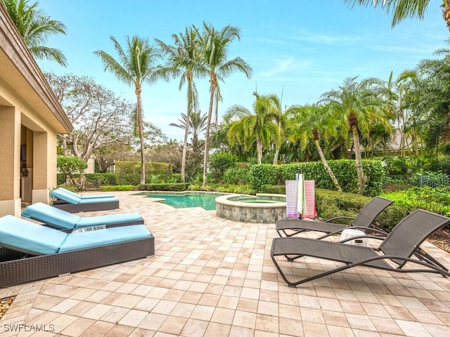 28732 La Caille Dr, Naples, FL 34119 - view of patio with a pool with connected hot tub