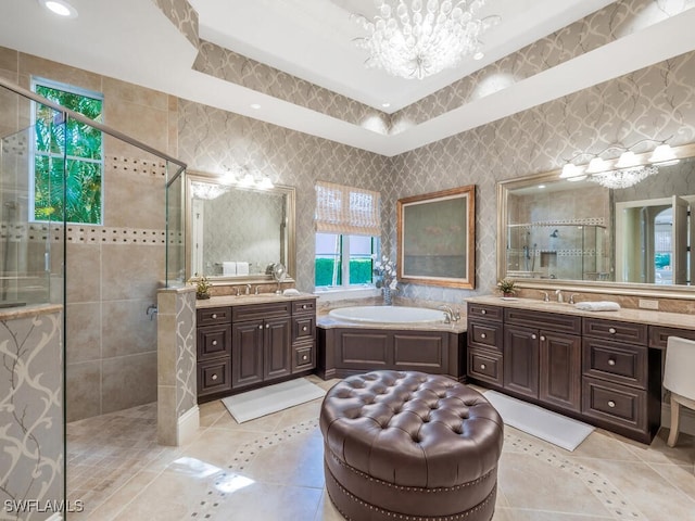 28732 La Caille Dr, Naples, FL 34119 - bathroom featuring a stall shower, a sink, a bath, wallpapered walls, and an inviting chandelier