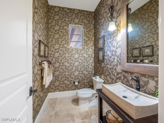 28732 La Caille Dr, Naples, FL 34119 - half bath featuring baseboards, wallpapered walls, toilet, and tile patterned floors