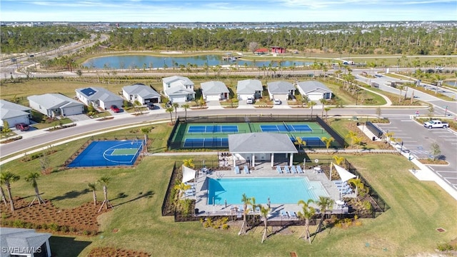 birds eye view of property featuring a water view