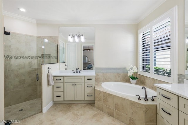 bathroom with ornamental molding, a stall shower, vanity, and a bath