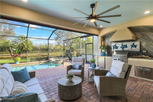 view of patio featuring a lanai, a grill, exterior kitchen, a pool with connected hot tub, and an outdoor living space