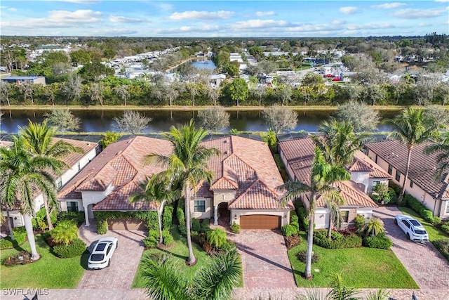 aerial view with a water view and a residential view