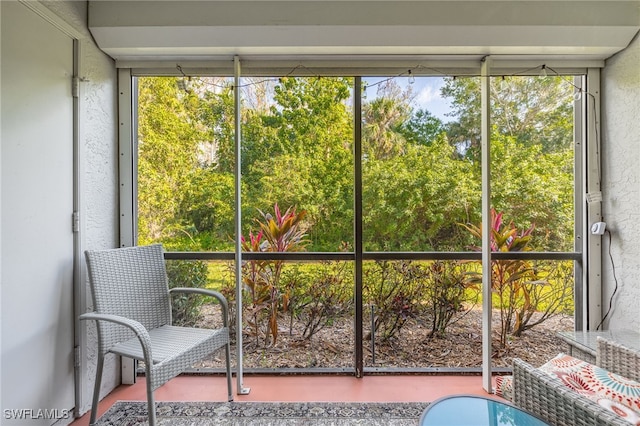 sunroom / solarium featuring plenty of natural light