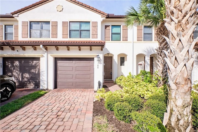 view of front of home with a garage