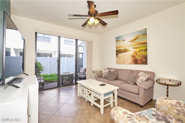 living room featuring tile patterned floors and ceiling fan